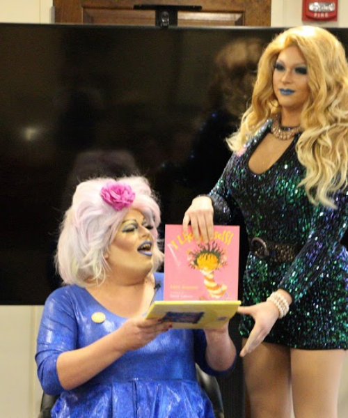 Drag queens Annie Manildoo and Bella Noche getting ready to read a story